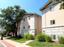 two tan apartment buildings